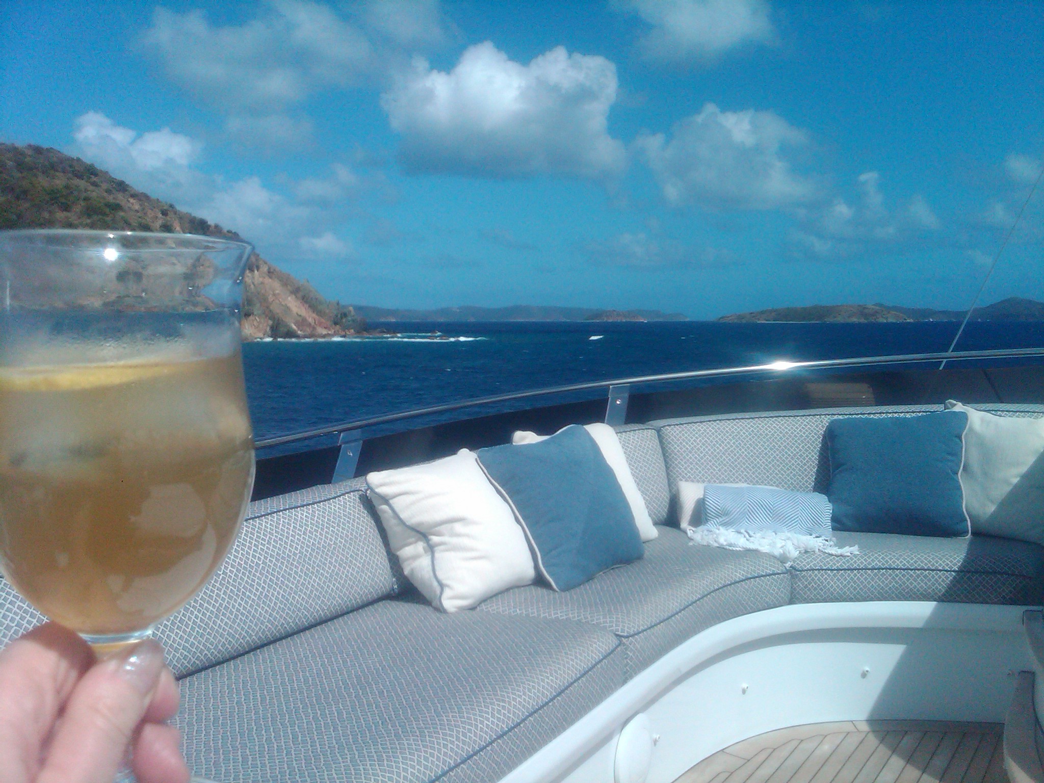 Wine glass toasting the journey on Tea Time Top Deck