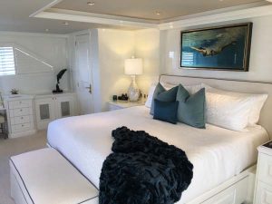 Master bedroom on luxury yacht bleisure travel for millennial work force