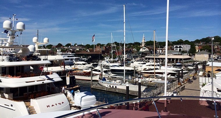 Motor and sailing yachts tied up at the docks for the NEWPORT Yacht Charter Show