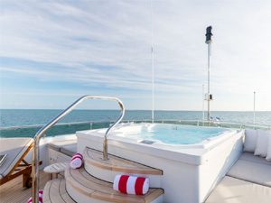Jacuzzi on yacht deck bleisure travel for the millennial work force