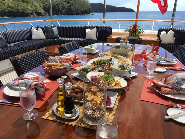 A feast laid out for dining onboard 142' LADY J in St. Lucia