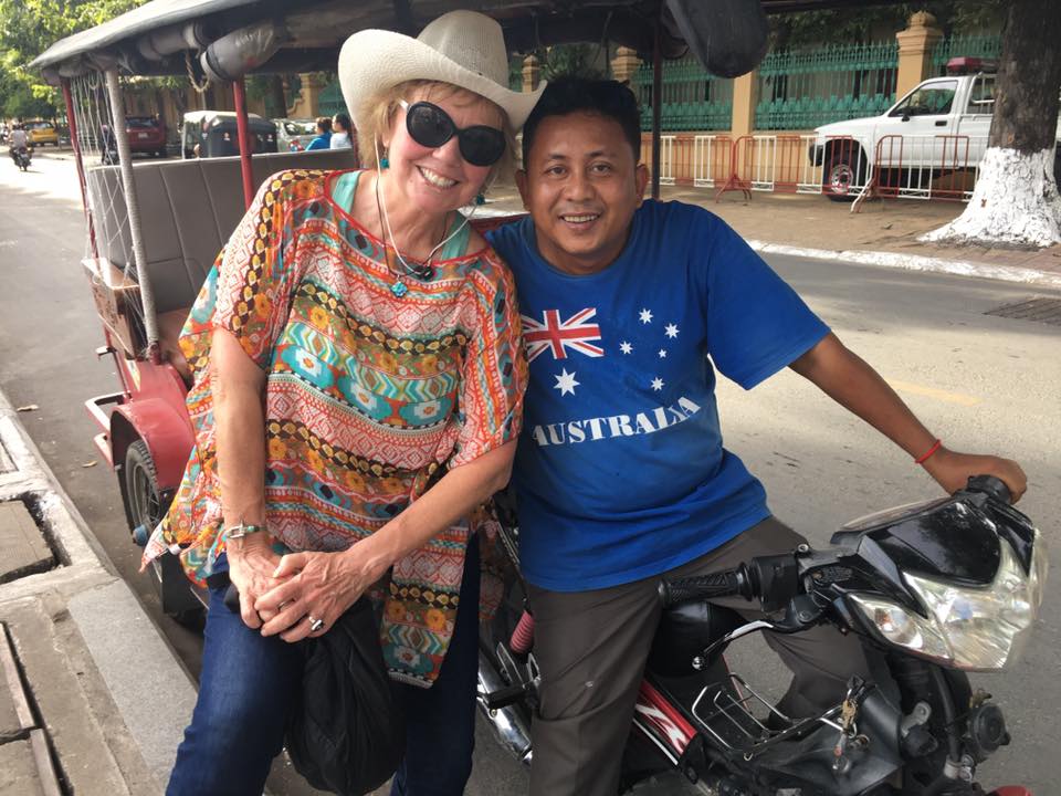 Carol with tuk tuk driver SomOn in Phnom Penh, Cambodia