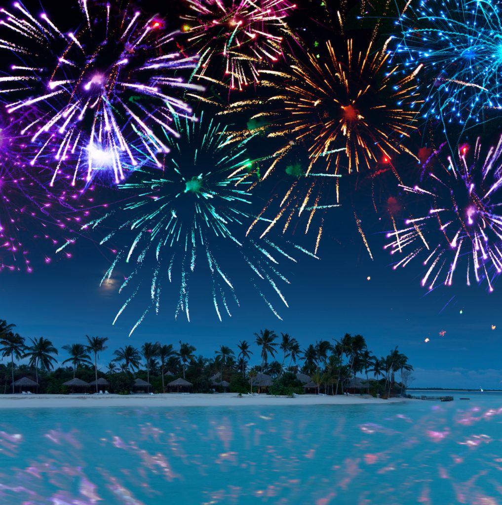 Festive New Year's fireworks over the tropical island