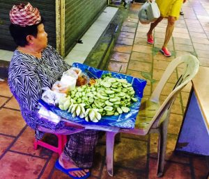 Selling green veg at Russian market in Phnom Penh, Cambodia