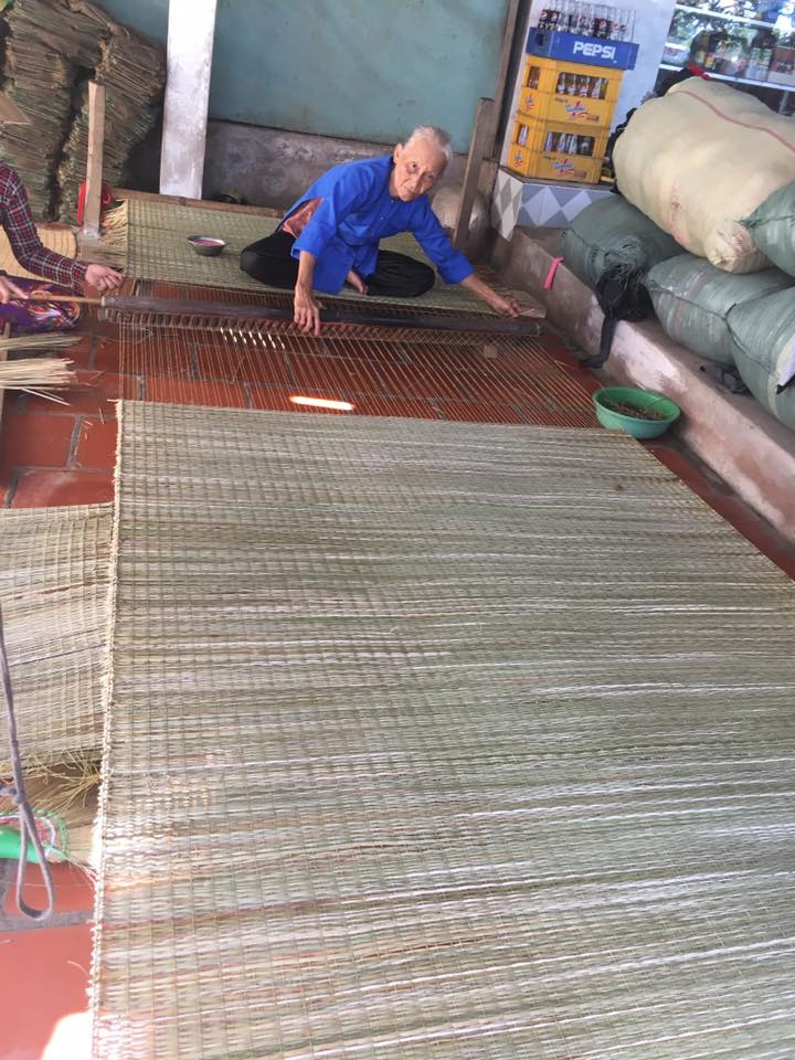 Weaver in Blue Shirt Working on Mat on Binh Thanh Island