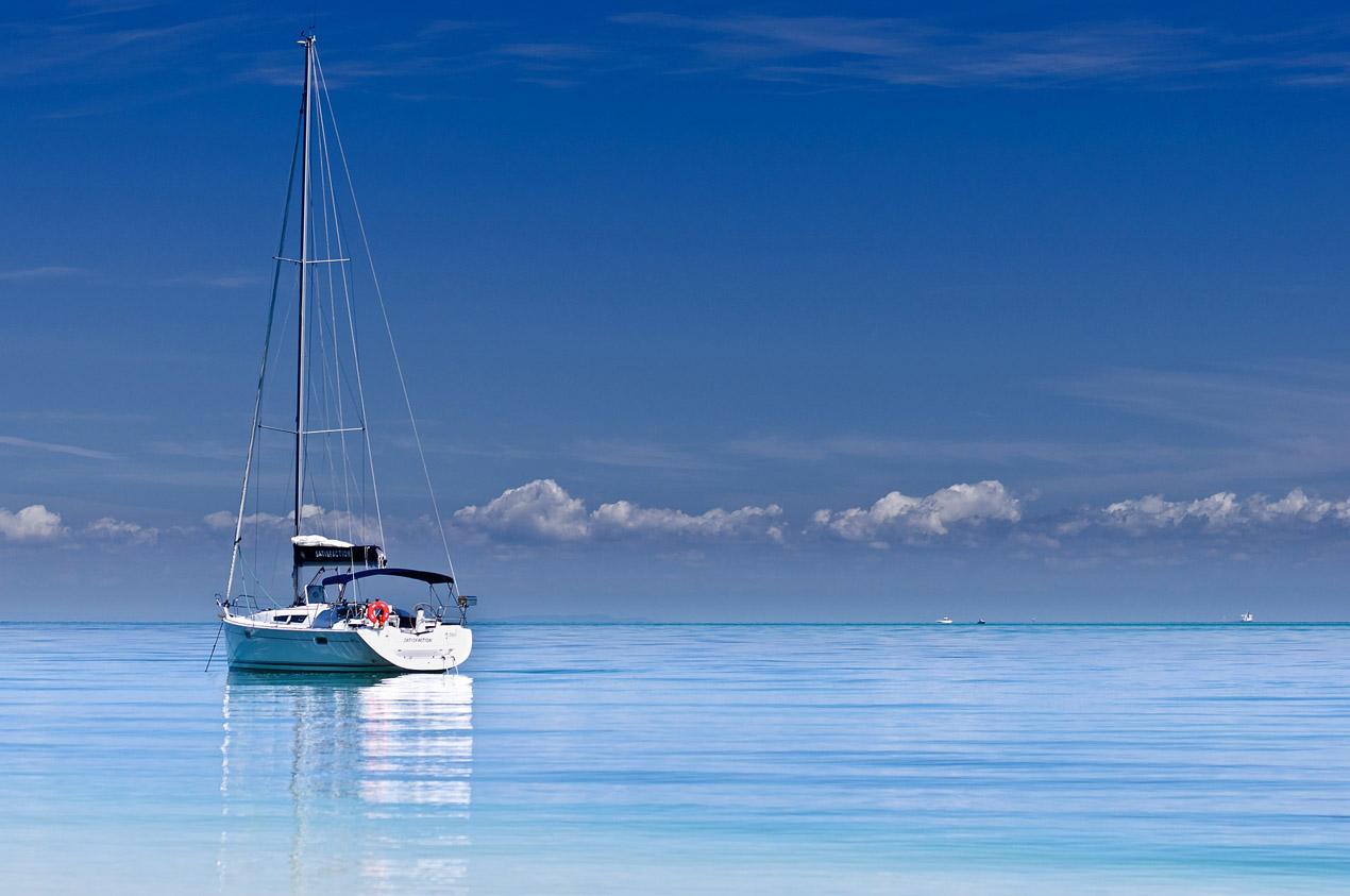 Sailboat on calm water in The Caribbean