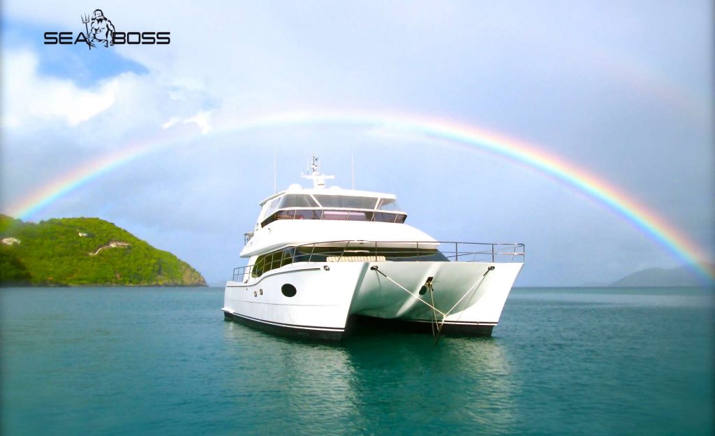 Rainbow over sailing catamaran SEA BOSS Caribbean Yachting Comeback