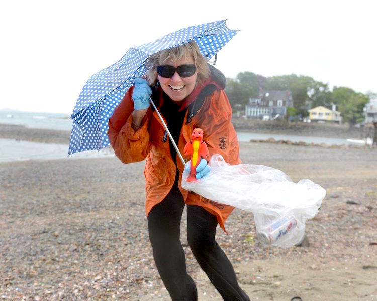 Carol Kent cleaning up Preston Beach in Marblehead, Massachusetts