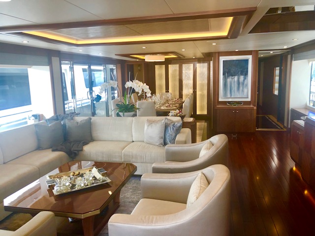Spacious saloon and dining room on the 120ft Ocean Alexander M/Y THE ROCK