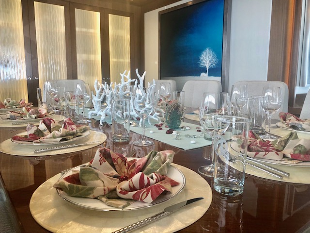 Luxurious table setting inside the 120ft motor yacht THE ROCK