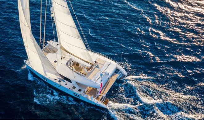 Aerial view of 70ft Sunreef catamaran OMBRE BLU³ in the Western Mediterranean