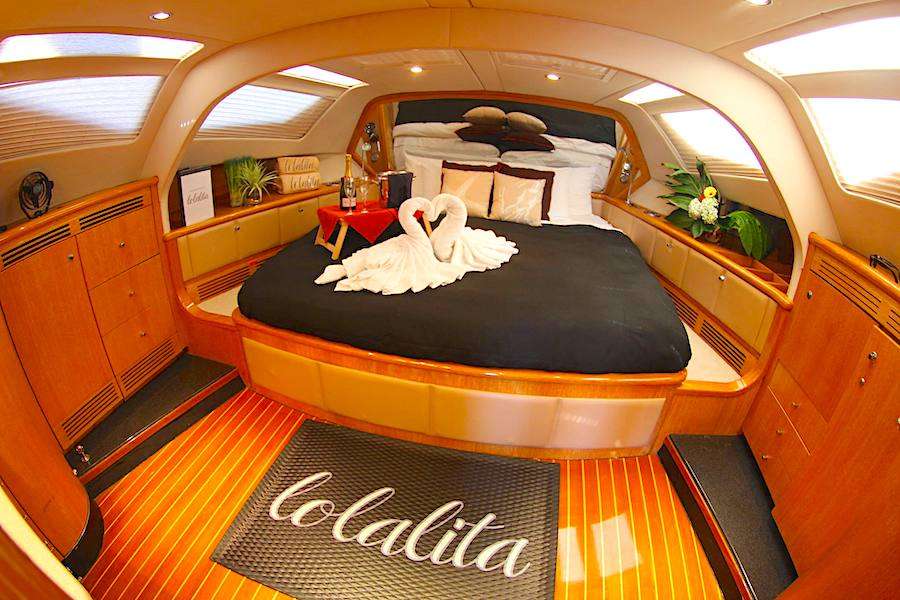 King cabin with swan towels on 65ft Privilege Yard sailing catamaran LOLALITA