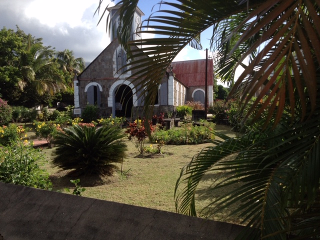 Church with lush tropical garden on St. Barths in the Caribbean