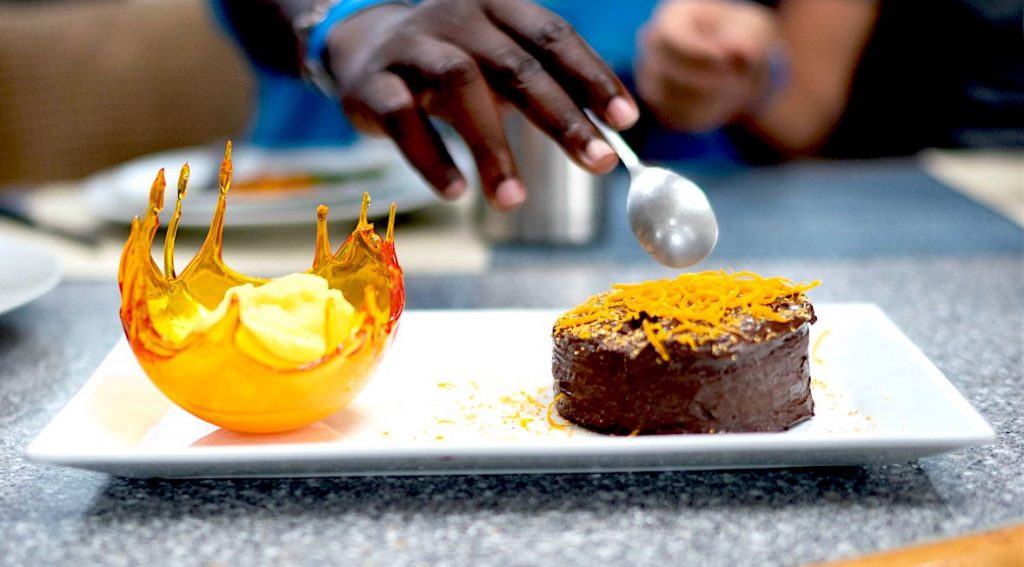 Orange sugar glass ice cream bowl and chocolate cake with orange peel at the US Virgin Islands Charter Yacht Show 2020