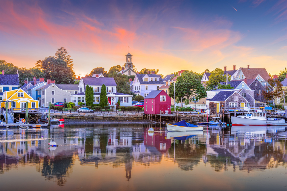 Famously beautiful coastal town Camden, Maine reflected in the harbor water