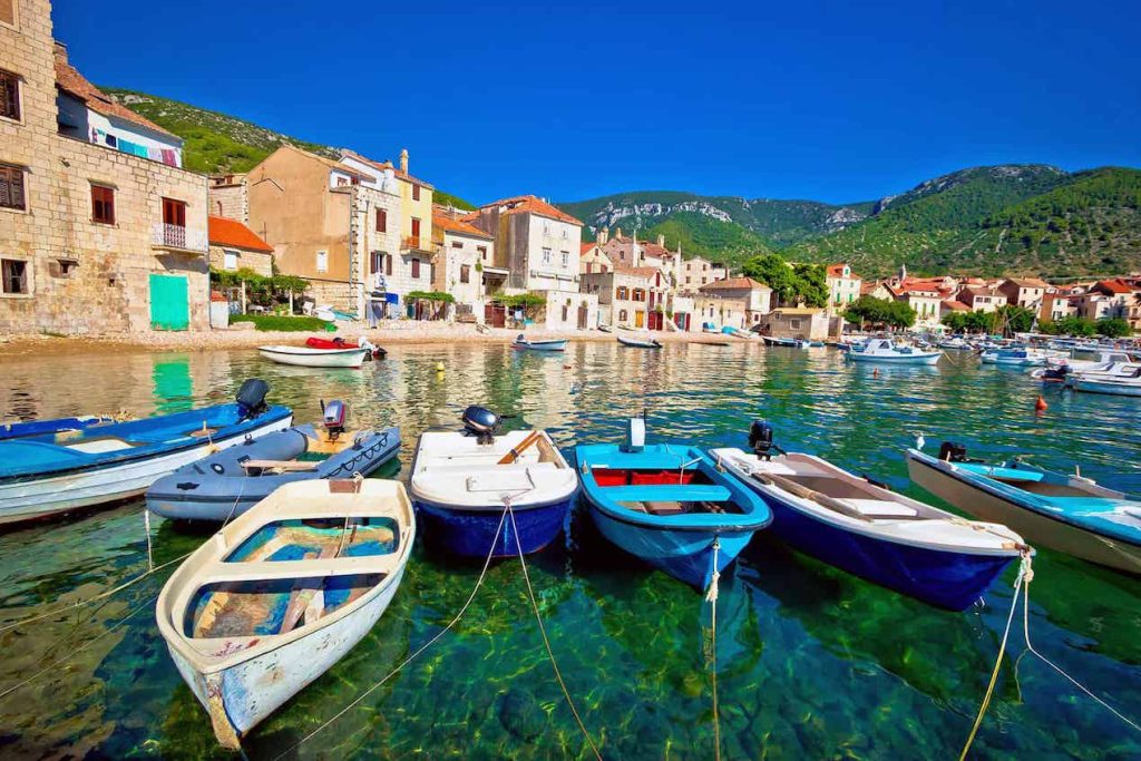 Island of Vis, Croatia, with colorful boats in harbor