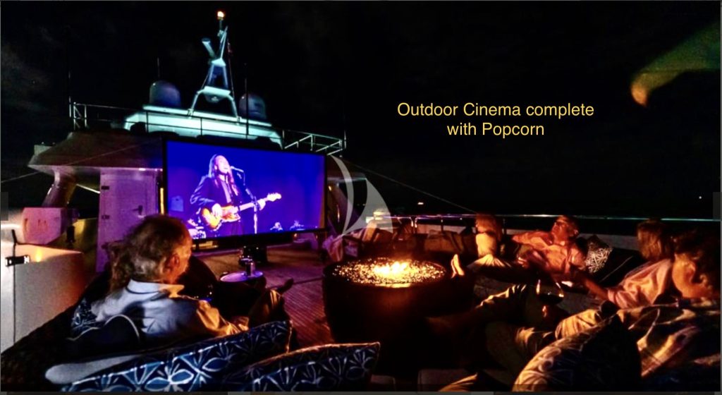 Outdoor cinema on the deck of 125ft motor yacht SEA AXIS