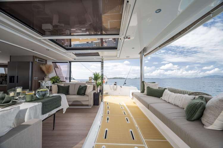 55ft HIGH 5's aft enclosed doors lift into the ceiling, providing an immense open space for the Caribbean trade winds to enter your living area. 