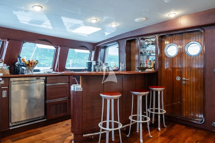 Galley with bar and stools onboard 138ft schooner sailing catamaran DOUCE FRANCE