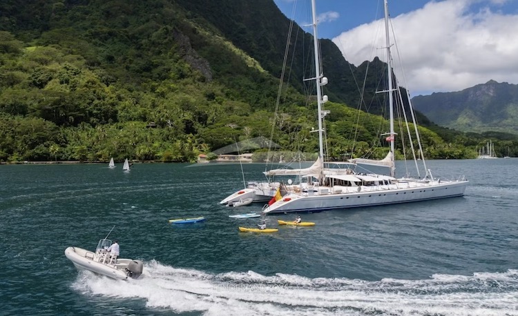 Kayaks and dinghies off 138ft schooner sailing catamaran DOUCE FRANCE