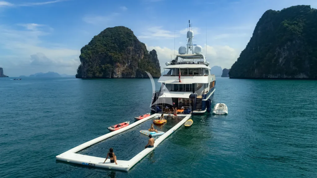 129ft Heesen motor yacht LADY AZUL has plenty of toys, this netted lap pool, and operates in South East Asia and East Asia