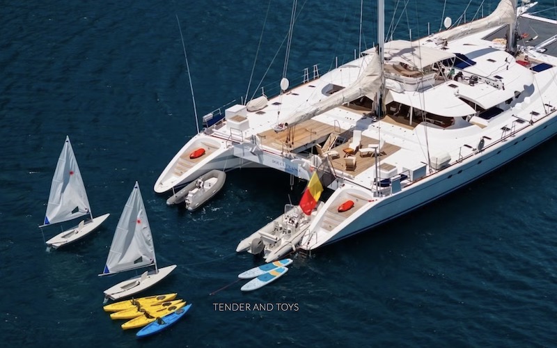 Sailboats, kayaks and standup paddleboards off 138ft schooner sailing catamaran DOUCE FRANCE