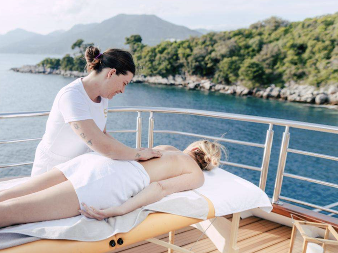 Al fresco massage on the deck of Symphony 172ft M-Y